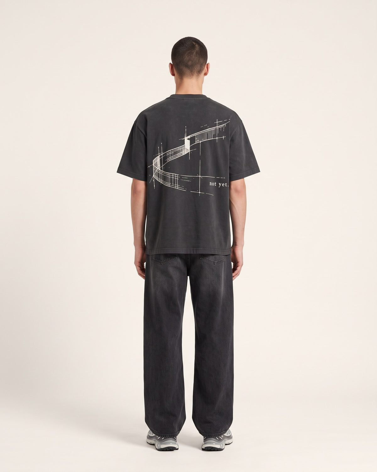 not yet. tee — faded black