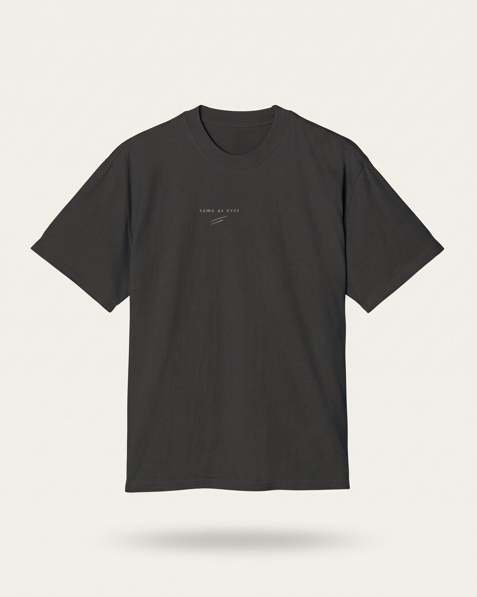 faded black oversized heavy tee, front: same as ever with a fine drawn slash on the chest